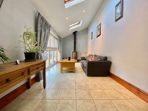 Rear Snug/Family Room- click for photo gallery